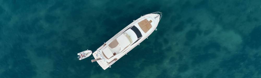 Sailboat in the sea in the evening sunlight over beautiful sea background, luxury summer adventure, active vacation in Mediterranean sea, Turkey