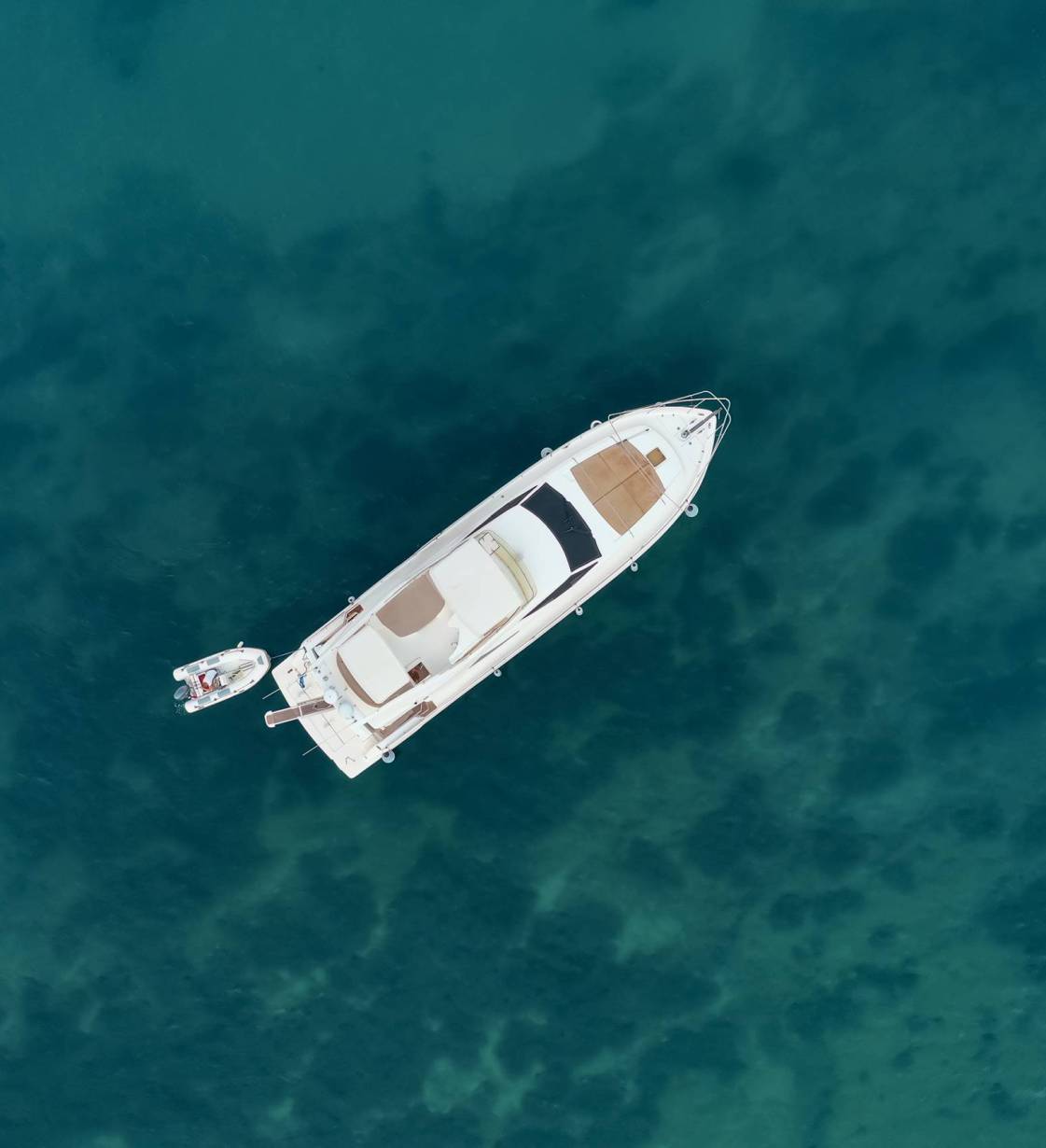 naz-denizcilik-01 Sailboat in the sea in the evening sunlight over beautiful sea background, luxury summer adventure, active vacation in Mediterranean sea, Turkey